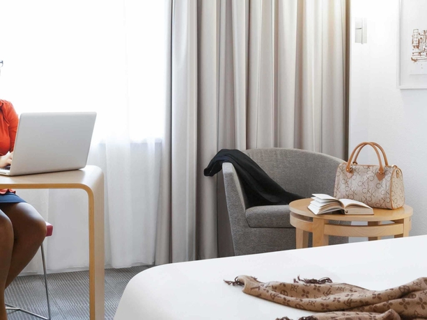 Imagen de la habitación del Hotel Novotel Zurich Airport Messe. Foto 12