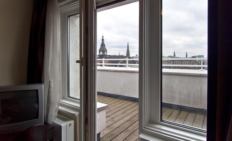 Imagen de la habitación del Hotel Novum Continental Hamburg Hauptbahnhof. Foto 11