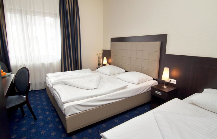 Imagen de la habitación del Hotel Novum Continental Hamburg Hauptbahnhof. Foto 12