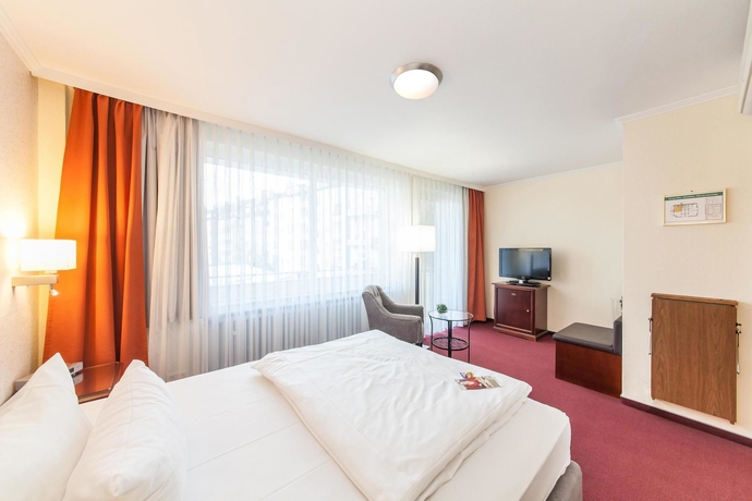 Imagen de la habitación del Hotel Novum Flora. Foto 5