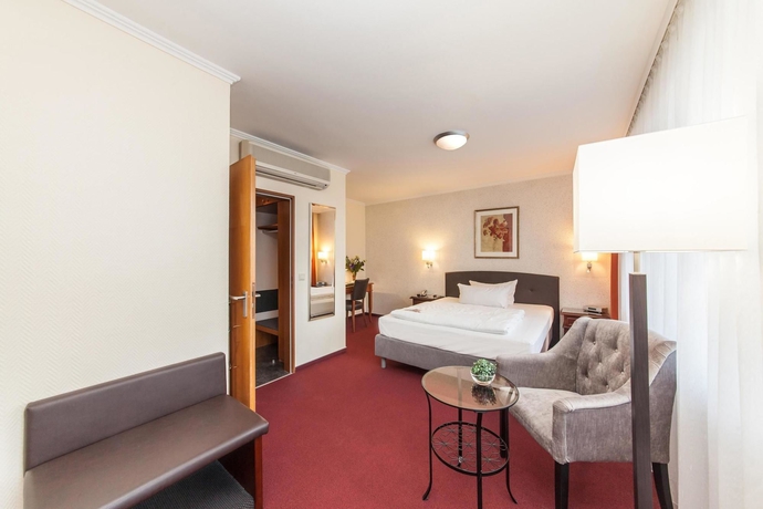 Imagen de la habitación del Hotel Novum Flora. Foto 6