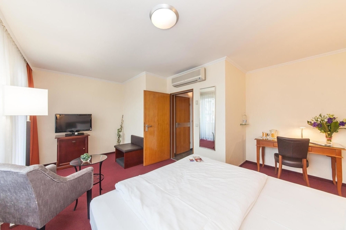 Imagen de la habitación del Hotel Novum Flora. Foto 8