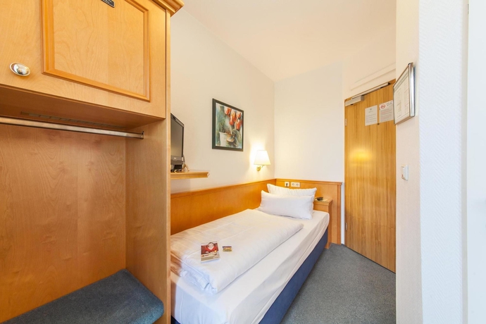 Imagen de la habitación del Hotel Novum Flora. Foto 9