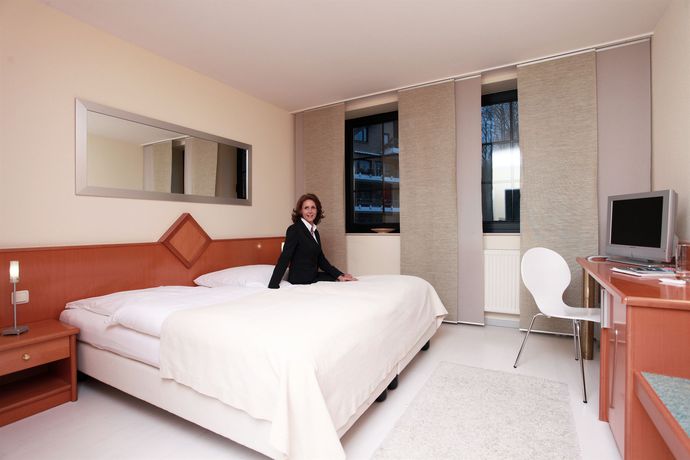 Imagen de la habitación del Hotel Novum Hotel Freiraum. Foto 5