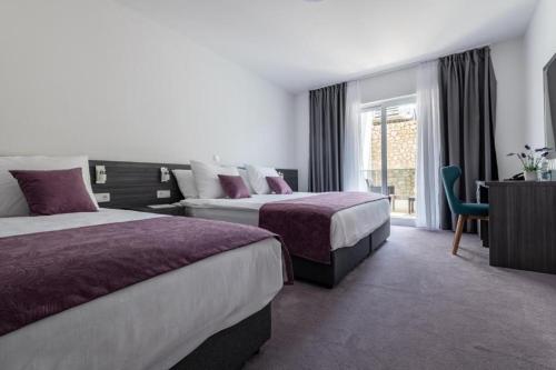 Imagen de la habitación del Hotel Novum, Neum. Foto 19