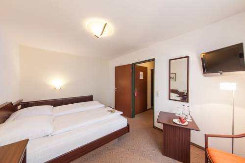 Imagen de la habitación del Hotel Novum Strijewski Wolfsburg. Foto 9