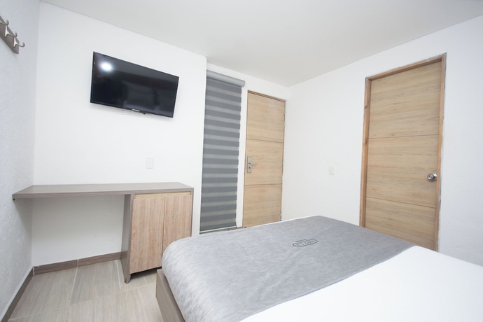 Imagen de la habitación del Hotel Novus Laureles. Foto 4