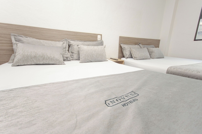 Imagen de la habitación del Hotel Novus Laureles. Foto 7
