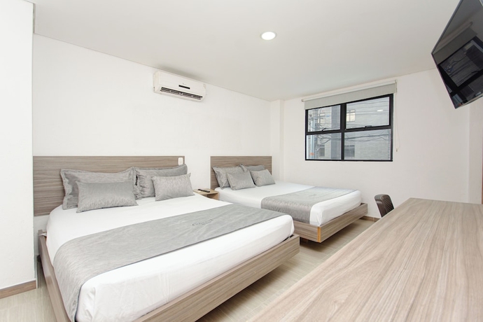 Imagen de la habitación del Hotel Novus Laureles. Foto 8
