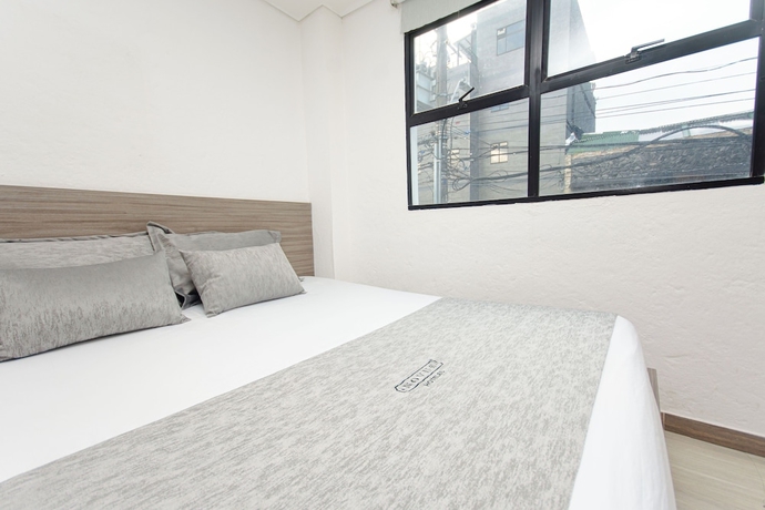 Imagen de la habitación del Hotel Novus Laureles. Foto 9