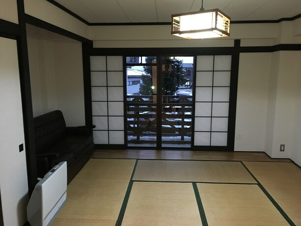 Imagen de la habitación del Hotel Nozawa Onsen Basecamp. Foto 17