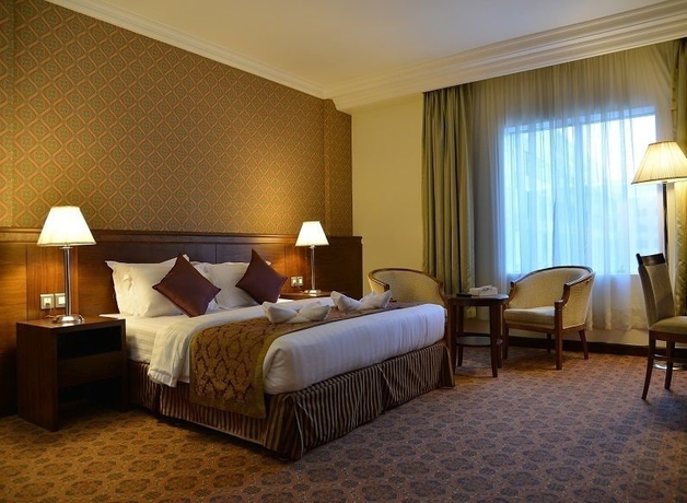 Imagen de la habitación del Hotel Nozol Royal Inn. Foto 14