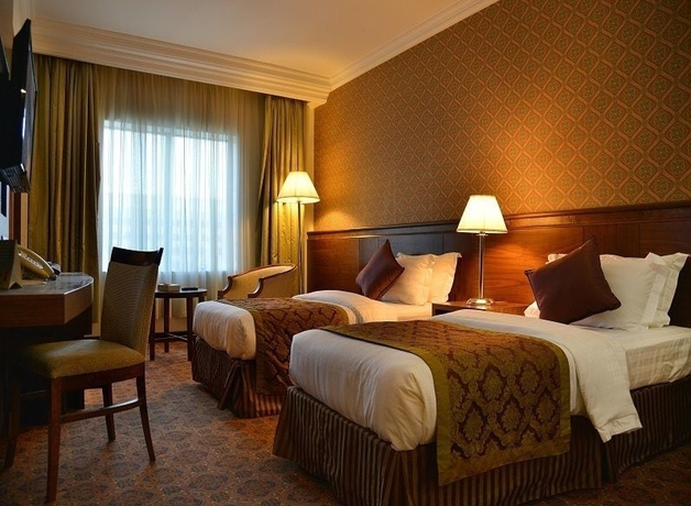 Imagen de la habitación del Hotel Nozol Royal Inn. Foto 15