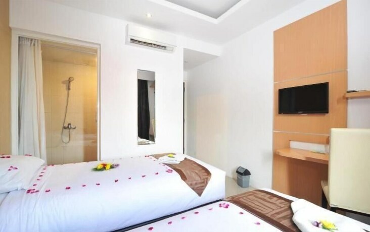 Imagen de la habitación del Hotel Nozz Semarang. Foto 19