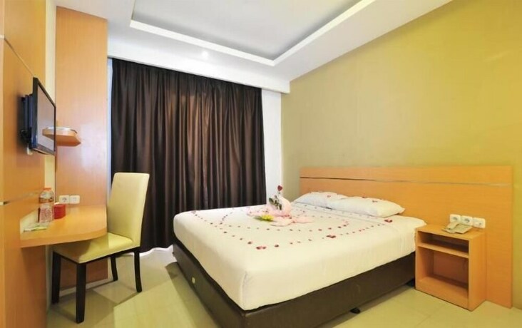 Imagen de la habitación del Hotel Nozz Semarang. Foto 22