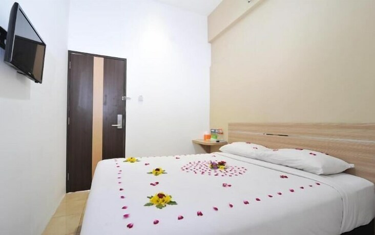Imagen de la habitación del Hotel Nozz Semarang. Foto 26