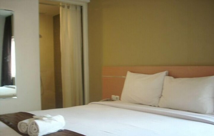 Imagen de la habitación del Hotel Nozz Semarang. Foto 30