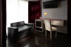 Imagen de la habitación del Hotel Nu House Boutique Hotel. Foto 4