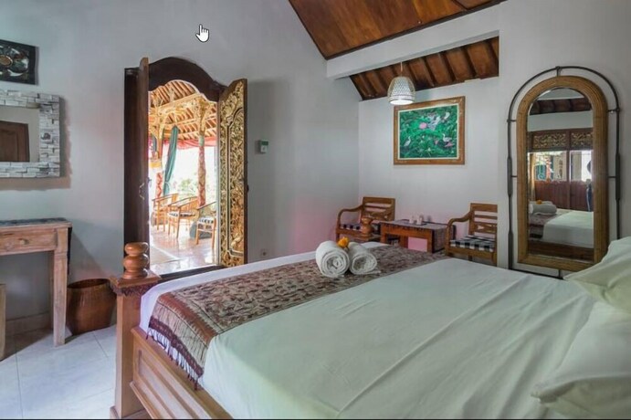 Imagen de la habitación del Hotel Nuaja Balinese Guest House. Foto 22