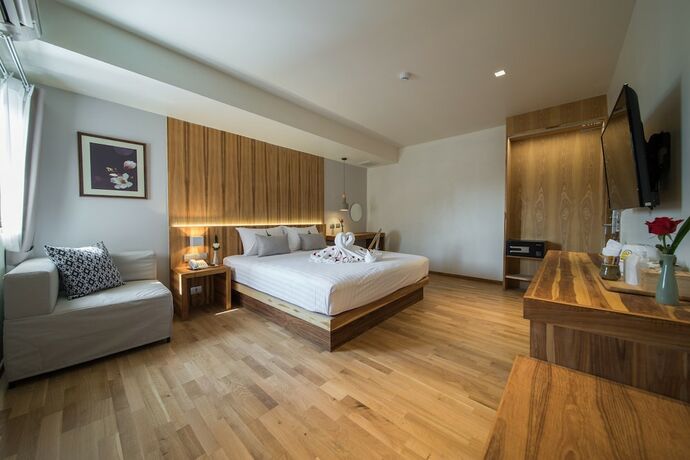 Imagen de la habitación del Hotel Nuan Boutique. Foto 17