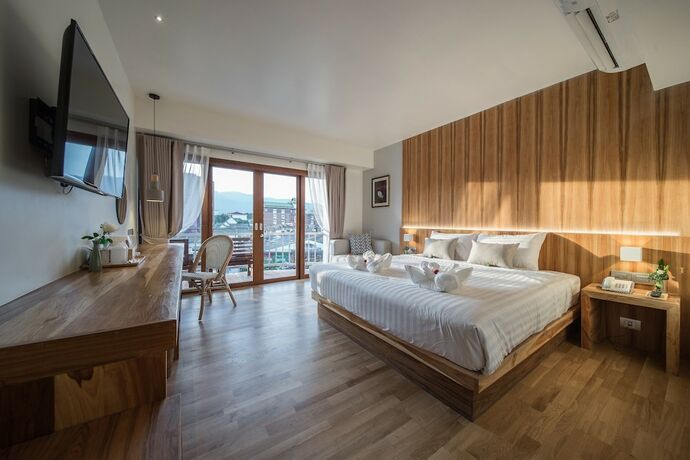 Imagen de la habitación del Hotel Nuan Boutique. Foto 19