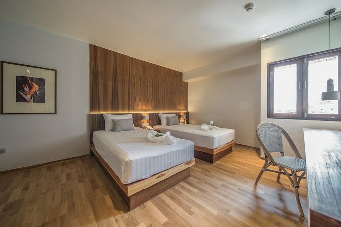 Imagen de la habitación del Hotel Nuan Boutique. Foto 21