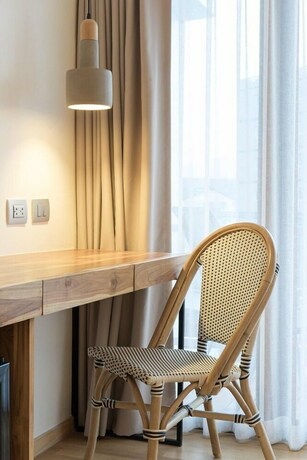 Imagen de la habitación del Hotel Nuan Boutique. Foto 24