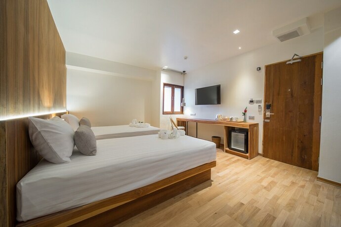 Imagen de la habitación del Hotel Nuan Boutique. Foto 26