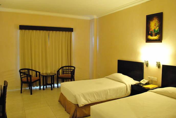 Imagen de la habitación del Hotel Nuansa Indah. Foto 7
