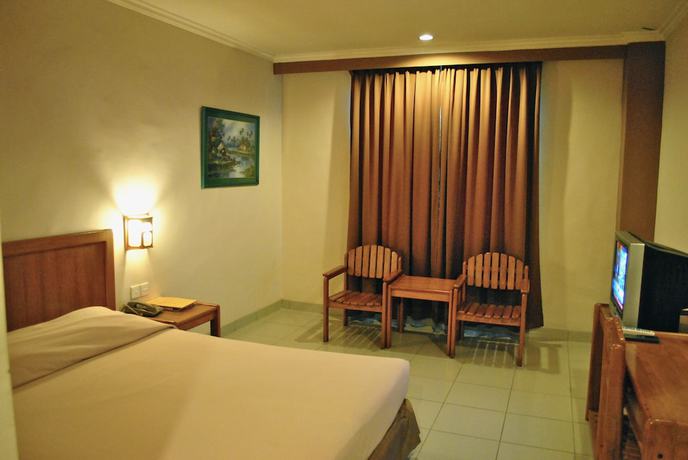 Imagen de la habitación del Hotel Nuansa Indah. Foto 8