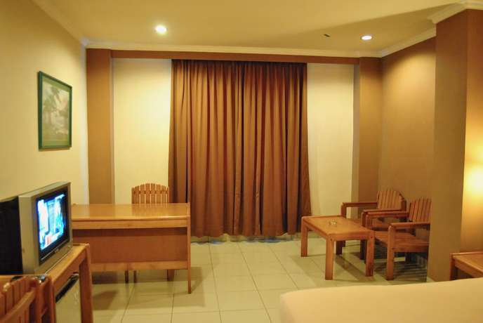 Imagen de la habitación del Hotel Nuansa Indah. Foto 15