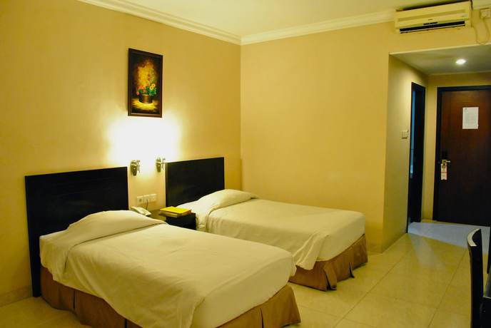 Imagen de la habitación del Hotel Nuansa Indah. Foto 17