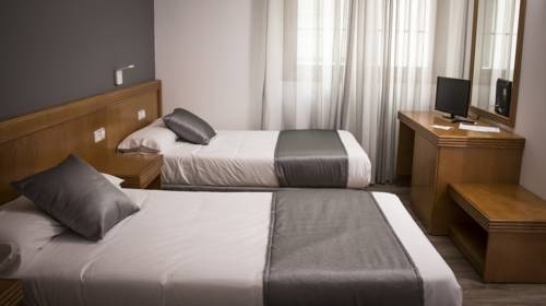 Imagen de la habitación del Hotel Nueva Colina. Foto 12