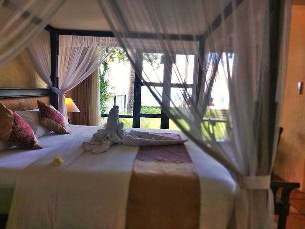 Imagen de la habitación del Hotel Nugraha Lovina Seaview Resort and Spa. Foto 10