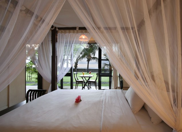 Imagen de la habitación del Hotel Nugraha Lovina Seaview Resort and Spa. Foto 11