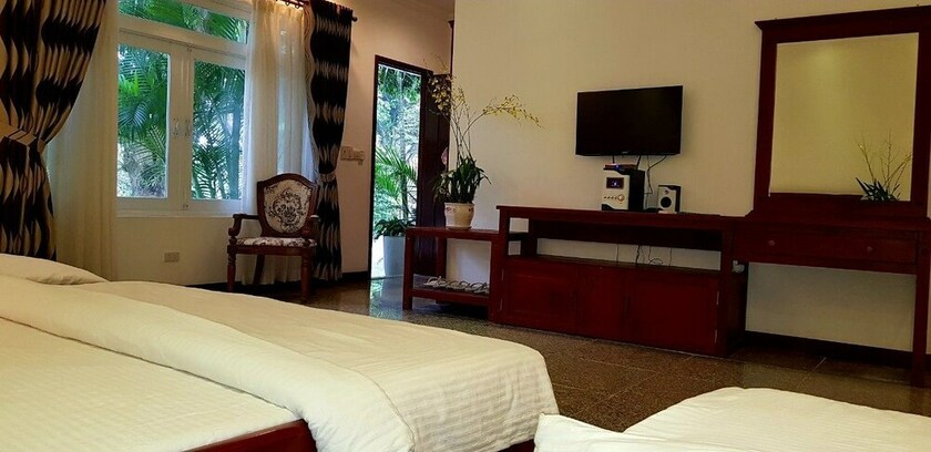 Imagen de la habitación del Hotel Nui Cam Resort. Foto 4