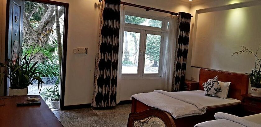 Imagen de la habitación del Hotel Nui Cam Resort. Foto 6