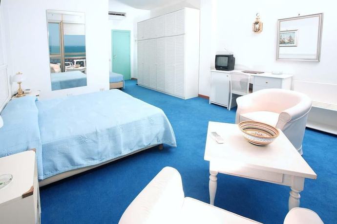 Imagen de la habitación del Hotel Numana Palace. Foto 12