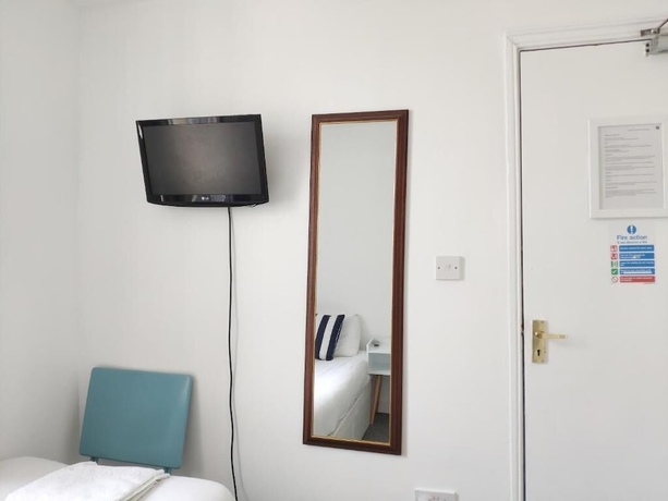 Imagen de la habitación del Hotel Number 75. Foto 5