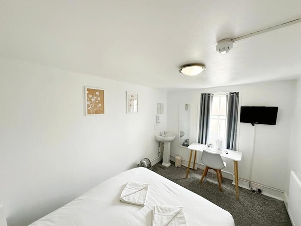 Imagen de la habitación del Hotel Number 75. Foto 9