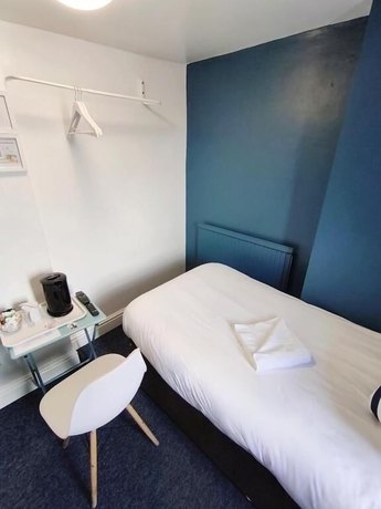 Imagen de la habitación del Hotel Number 75. Foto 11