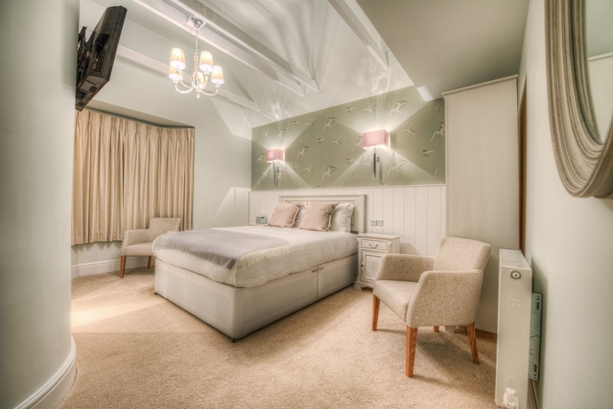 Imagen de la habitación del Hotel Number Four Boutique. Foto 6