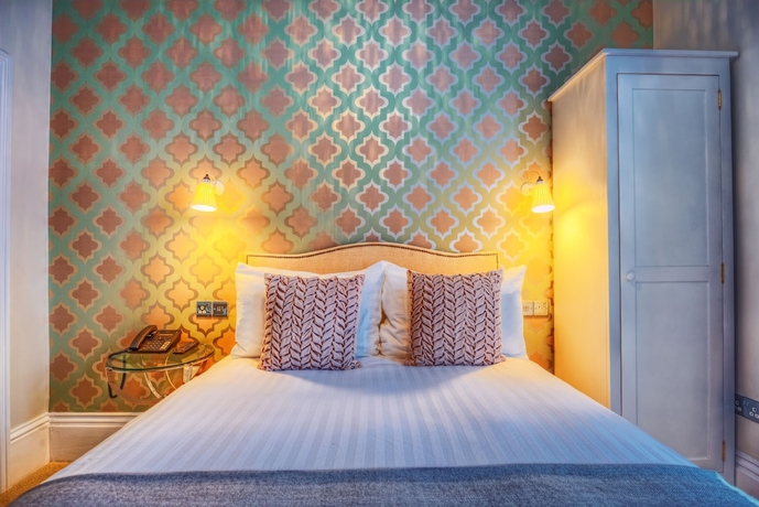 Imagen de la habitación del Hotel Number Four Boutique. Foto 8