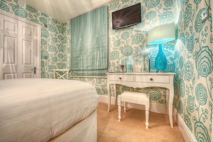 Imagen de la habitación del Hotel Number Four Boutique. Foto 9