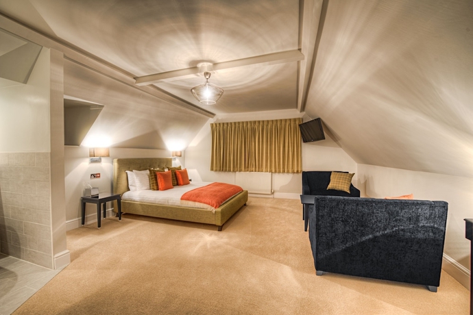 Imagen de la habitación del Hotel Number Four Boutique. Foto 10