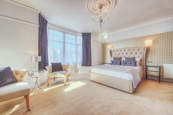 Imagen de la habitación del Hotel Number Four Boutique. Foto 16