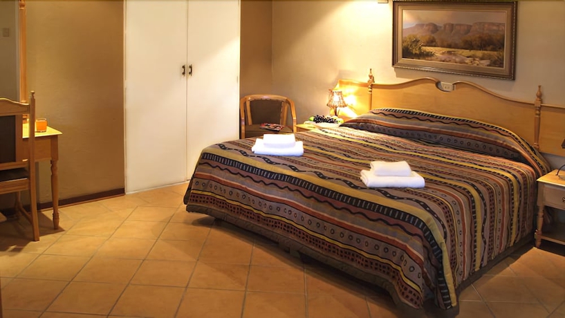 Imagen de la habitación del Hotel Numbi and Garden Suites. Foto 7