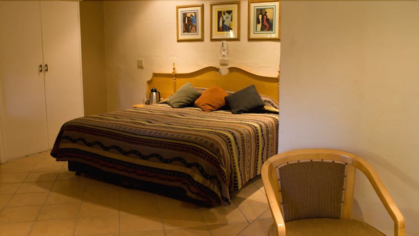 Imagen de la habitación del Hotel Numbi and Garden Suites. Foto 8