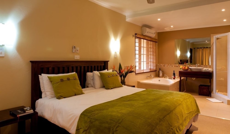 Imagen de la habitación del Hotel Numbi and Garden Suites. Foto 14