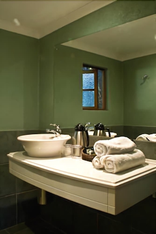 Imagen de la habitación del Hotel Numbi and Garden Suites. Foto 15